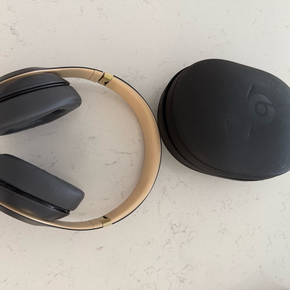 Gold and Black Wireless Headphones